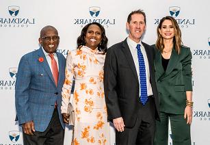 Image of Rebecca Jarvis, President Eden, Deborah Roberts and Al Roker in front of a step and repeat of Landmark College logos at the 2024 gala fundraiser